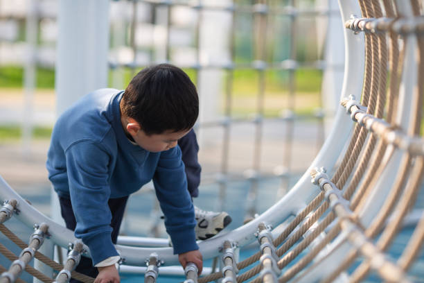 istock Asian boy playing outdoors 1484264615