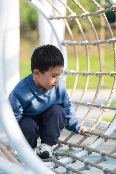 istock Asian boy playing outdoors 1484264717