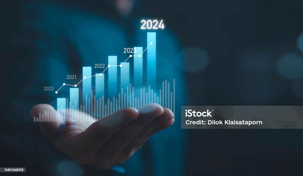 Businessman holding glowing virtual technical graph and chart for analysis stock market in 2024, technology investment and value investment concept. - Royalty-free Groei Stockfoto Businessman holding glowing virtual technical graph and chart for analysis stock market in 2024, technology investment and value investment concept. - Royalty-free Groei Stockfoto