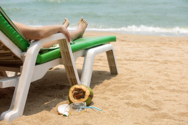 Garbage on beach left by tourist, environmental pollution concept.
