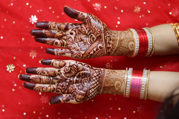 istock Handmade Mehendi art with red Background 1484274057