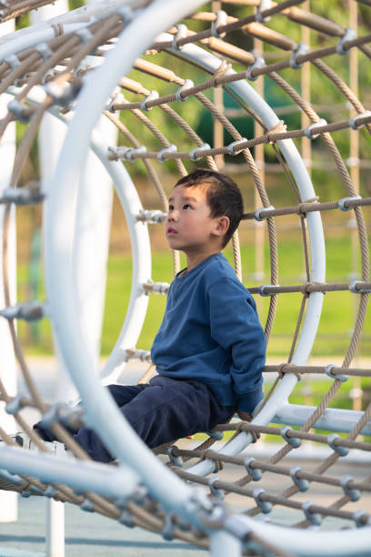 istock Asian boy playing outdoors 1484276114