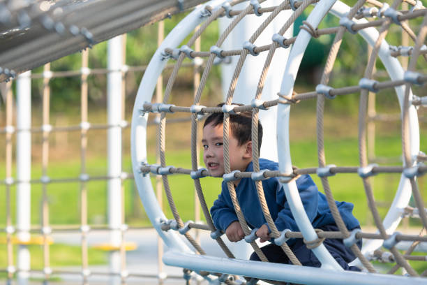 istock Asian boy playing outdoors 1484276119