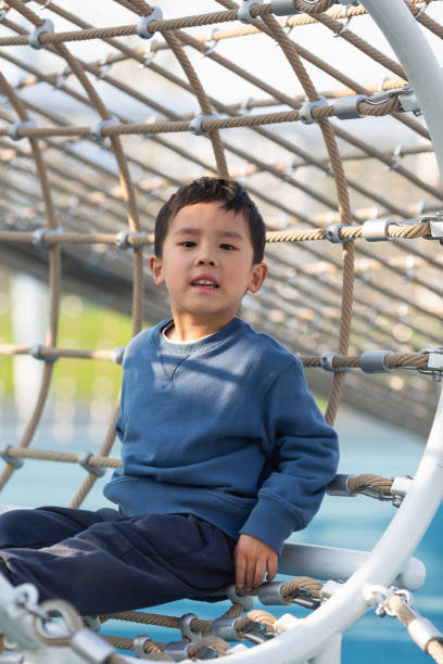 istock Asian boy playing outdoors 1484276141