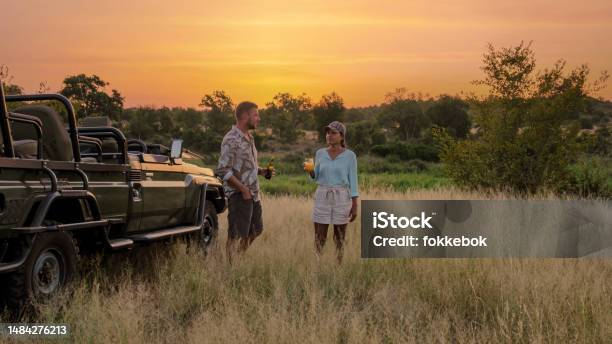 Asian Women And European Men On Safari Game Drive In South Africa Kruger National Park Stock Photo - Download Image Now