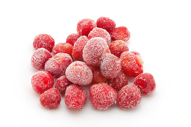 istock handful of frozen strawberries 148427808