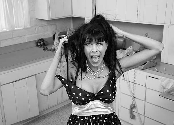 Screaming Retro Style Woman in Messy Kitchen