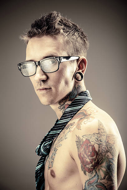 istock Young male with tattoos 148428057