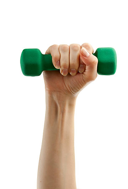 istock Dumbbell in female hand 148428121