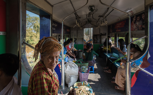 Yangon, Myanmar - December 26, 2016: City line of local railway transportation is a public service for local people in greater Yangon, Myanmar.