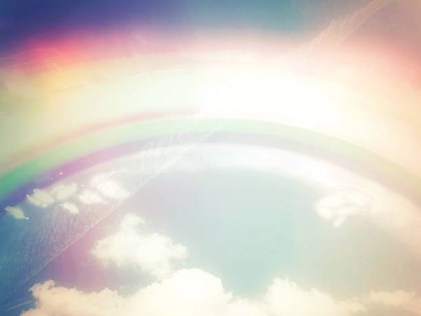 istock Abstract background with rainbow in the sky 1484283183