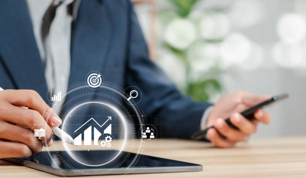 istock Businessman analyzing business growth graph data chart. Strategic planning and analysis of financial and investment data, business. 1484283204