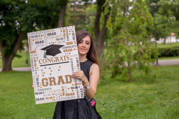 istock Excited young woman on graduation day 1484291008
