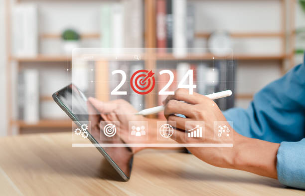 istock Businessman analyzing economic trend data for long-term investment. Development to success and motivation. New year business goals 2024 and positive indicators 2024. 1484291023