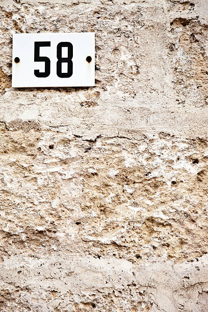istock 58, Street Number On The Wall 148429680