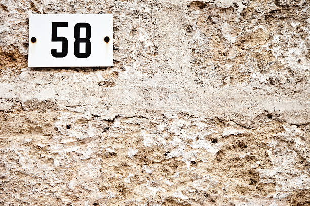 istock 58, Street Number On The Wall 148429687