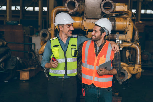 istock professional industry occupation man and men at work concept, factory, manufacturing engineer training a work to manager foreman for business safety technology, construction machine learning workshop 1484296954