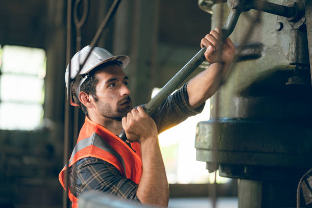 istock men at work concept, confident engineer person man occupation or professional manufacturing technician foreman portrait with industry safety helmet, inspector job manager to work in factory warehouse 1484297389