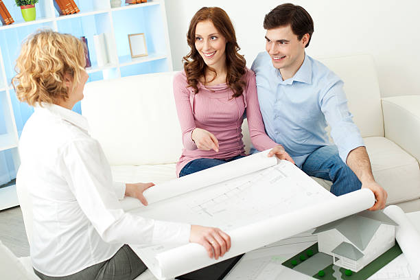 istock Couple Meeting With Architect. 148429856