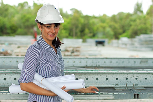 young engineer woman in the warehouse stock photo