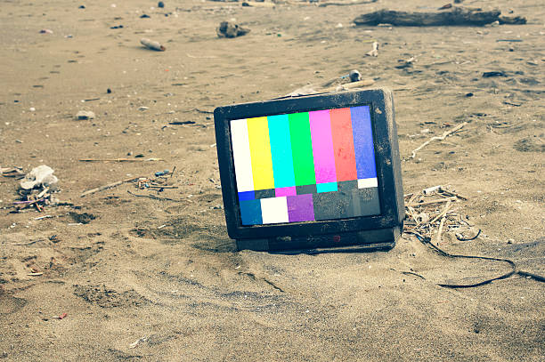 old TV playing color bars in desert .with path on screen