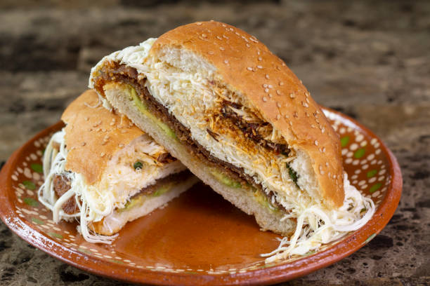 cemita cake with oaxaca cheese, mexican sandwich. Mexican food