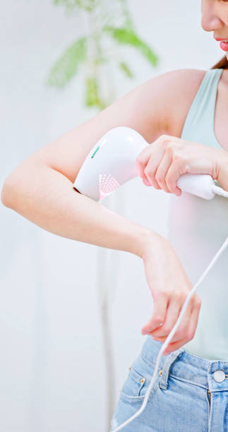 istock girl shaving arm hair 1484310064