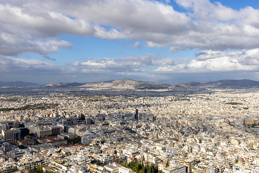 Athens, Greece - October 18, 2022: Aerial view of the city from the Mount Lycabettus on a sunny day. Peak is the highest point in Central Athens