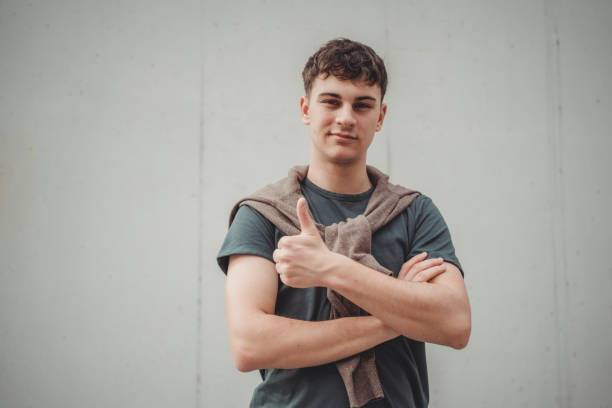istock Portrait of a high school student standing next to a wall 1484310504