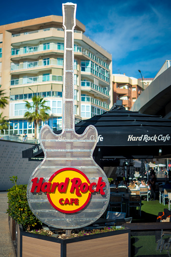 Malaga, Spain, April 2023: View on outdoors guitar of the Hard Rock Cafe in Malaga, Spain