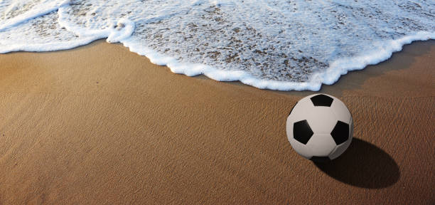 istock soccer ball on the beach 1484317565