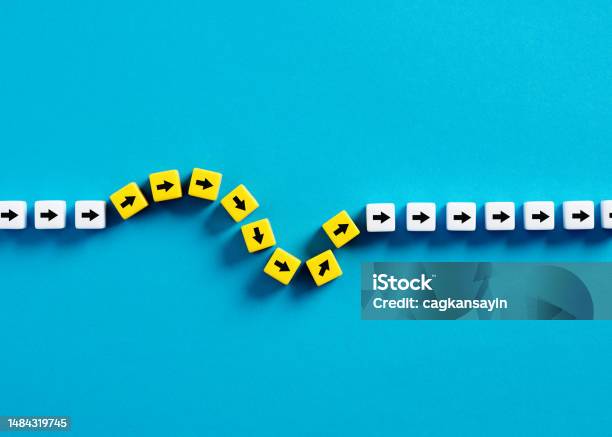 Flexibility And Adaptation Concept Arrows On Cubes Following A Flexible Path Stock Photo - Download Image Now