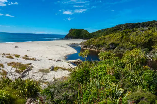 Photo of Bruce Bay on the Tasman Sea, South Westland, South Island, New Zealand. A nesting ground for the crested penguin and endemic Hector's dolphins.