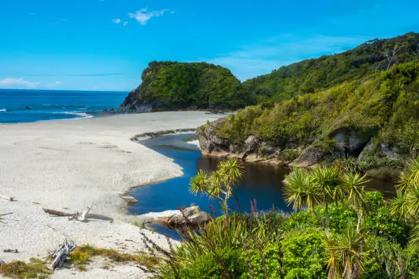 Photo of Bruce Bay on the Tasman Sea, South Westland, South Island, New Zealand. A nesting ground for the crested penguin and endemic Hector's dolphins.