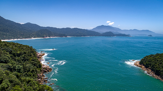 Aerial view to wonderful Green Coast bay and mountains covered with Atlantic Forest, Picinguaba, Brazil