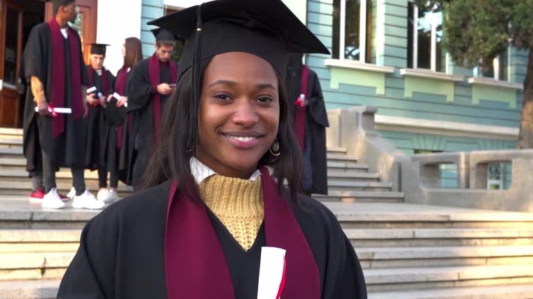 An Afro-Caribbean graduate student looking at the camera