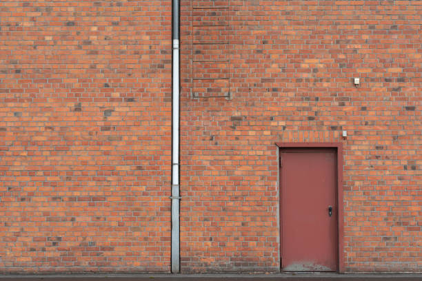 Red stone facade of an old warehouse in the harbor