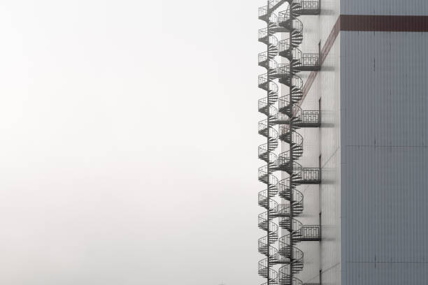 external double spiral staircase on the facade of a high warehouse in Bremen