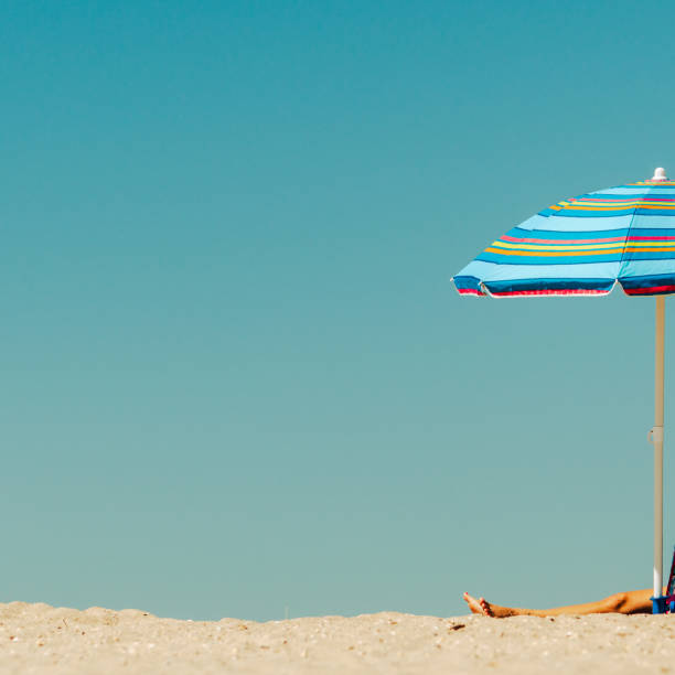 istock Partial view of an umbrella on the beach 1484335941