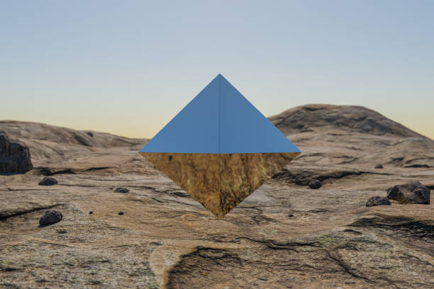 istock single metal prism pyramid cube hovering in the air in large empty desert environment; abstract surreal concept; 3D Illustration 1484340421