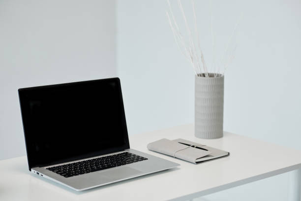 istock Laptop and Planner on Desk 1484354413