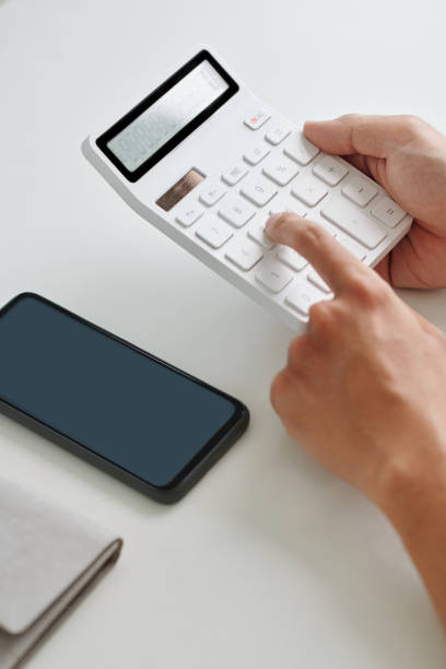 istock Entrepreneur Calculating Profit 1484354442