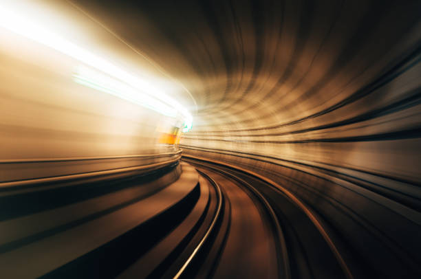 treno ad alta velocità - night cityscape dubai long exposure foto e immagini stock