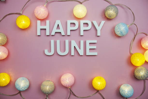 istock Happy June alphabet letters on pink background 1484383661