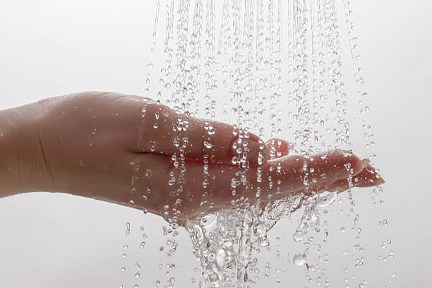 istock Water from Shower Drops on Palm 148438489