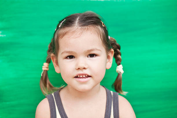 Asian girl on a green background