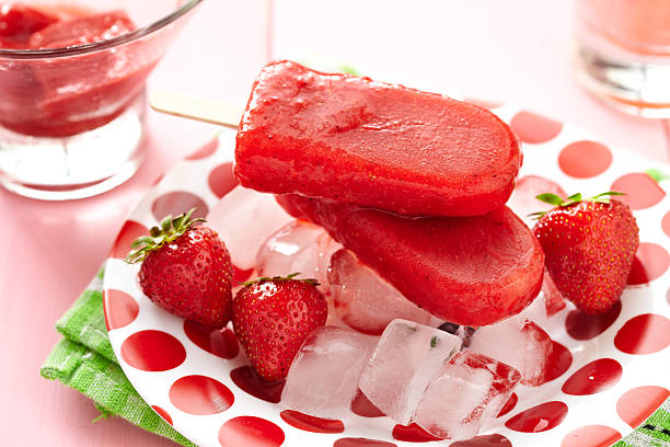 istock Fresh strawberries along with strawberry popsicles 148440467