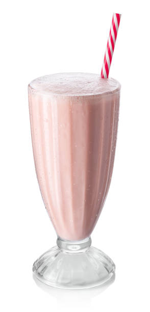 istock cold strawberry milkshake in glass with straw isolated on white 1484443106