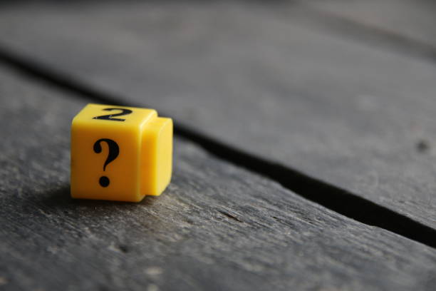 istock Question mark concept, inscription on yellow cubes. 1484447637