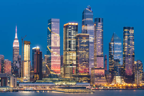 istock Manhattan skyscrapers during dusk sunlight, modern buildings 1484452826